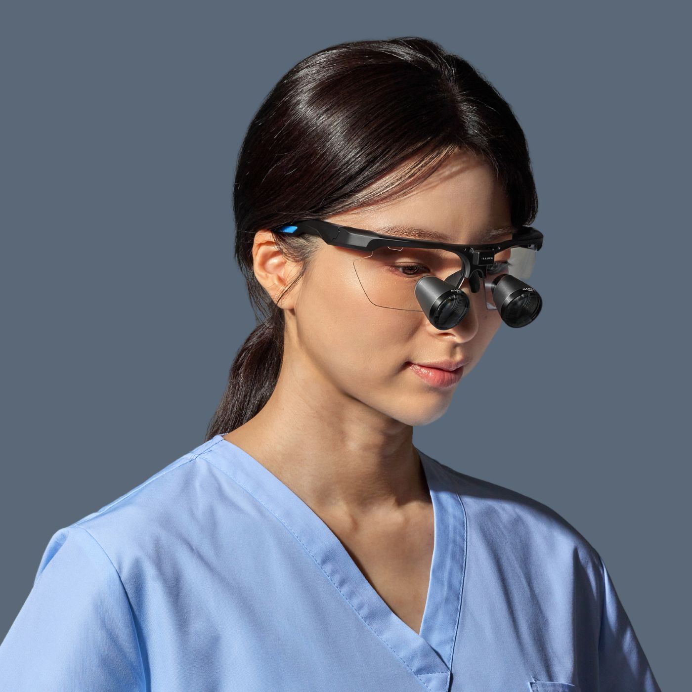 student wearing loupes