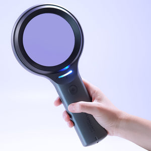 Front of IDS-3100 in hand UV light on