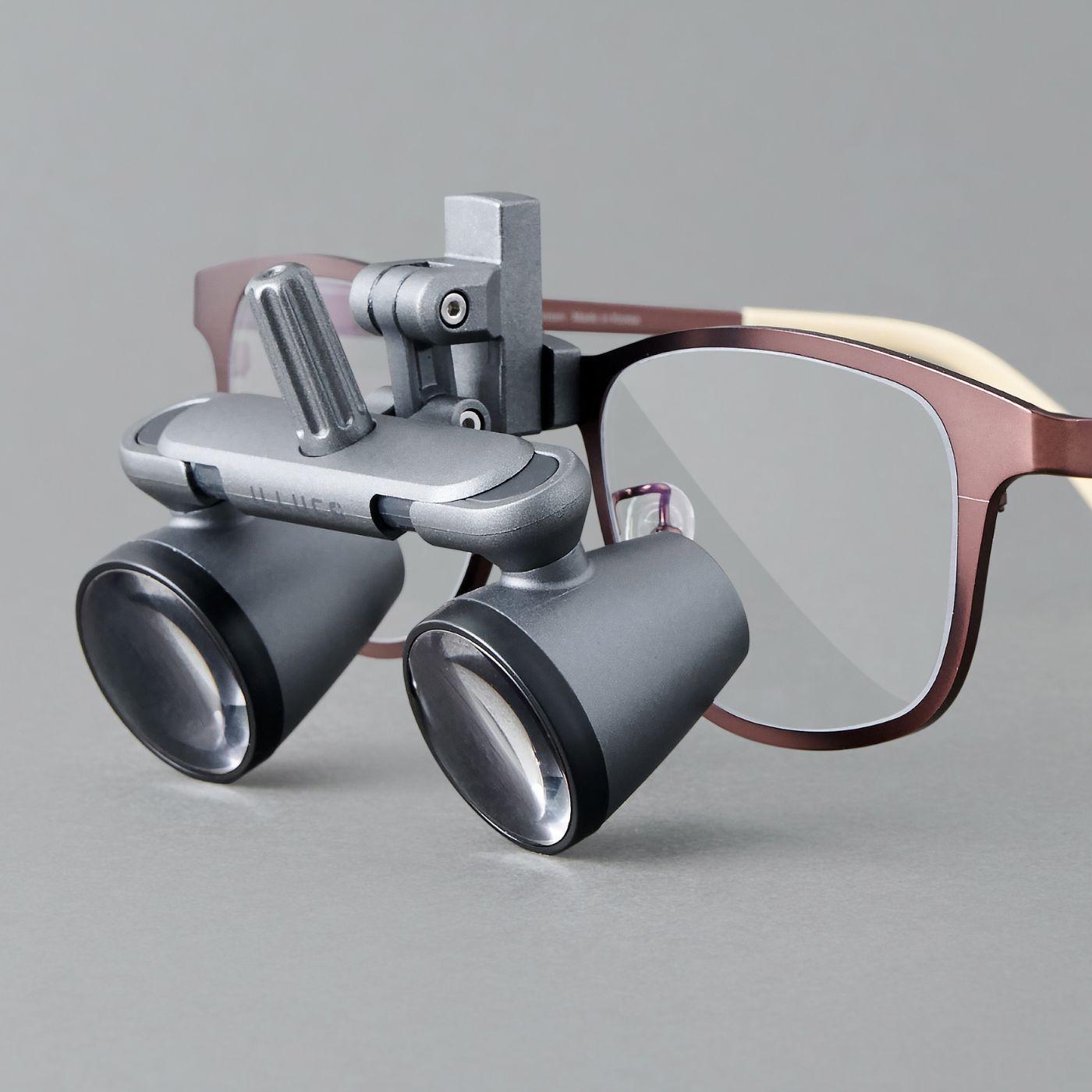 ILLUCO Flipup loupes on coffee color frame